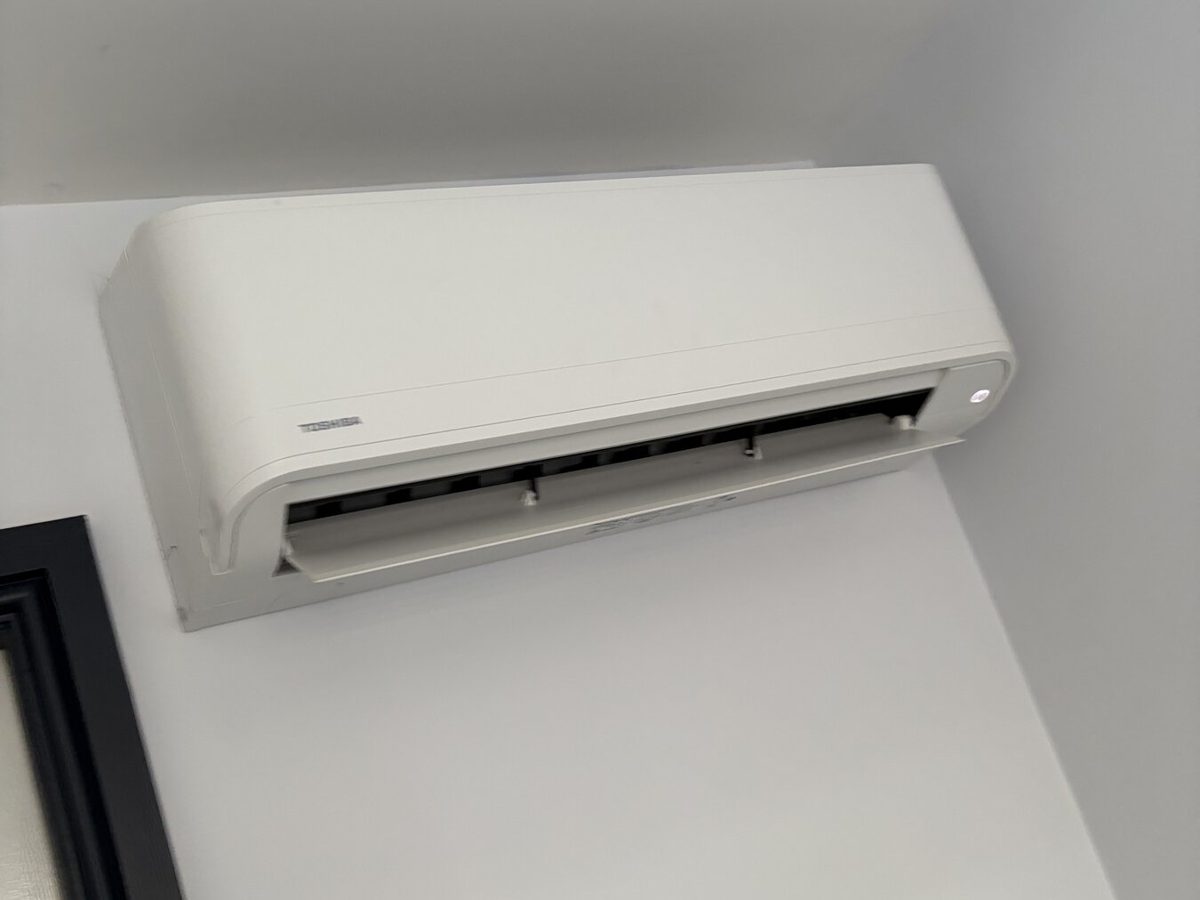 A wall-mounted air conditioning unit